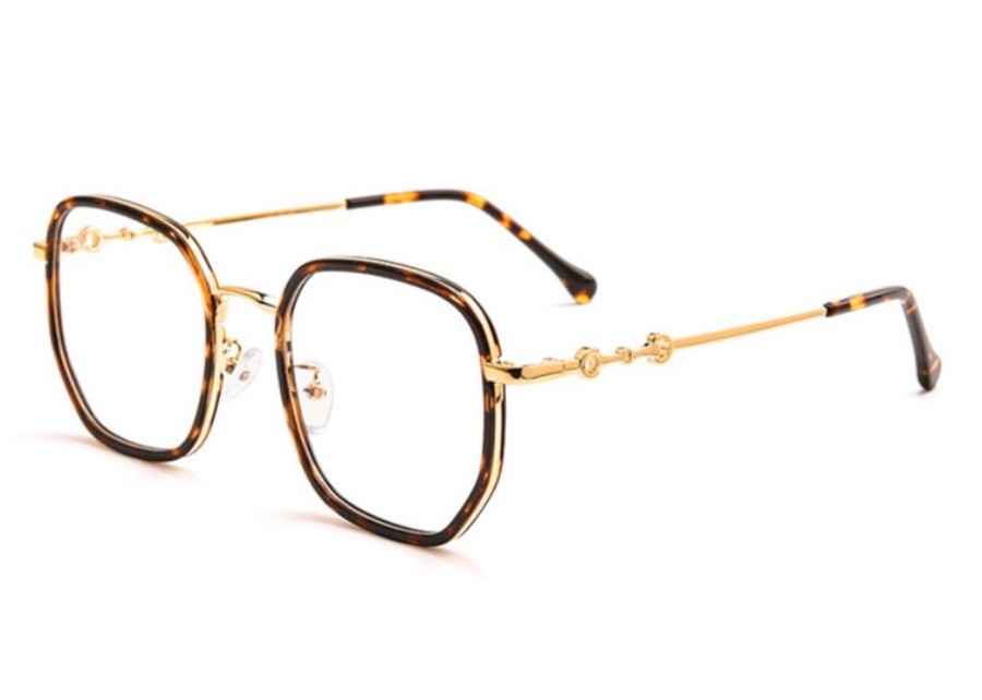 A pair of modern stainless steel glasses with a matte finish next to a colorful anodized aluminum frame.