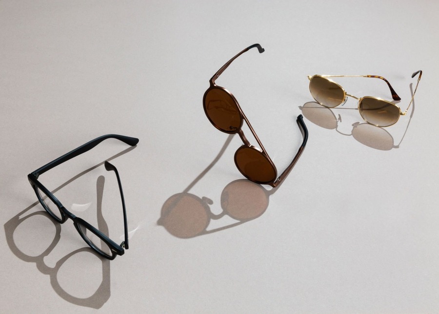A collage of different premium eyewear materials like acetate, titanium, and horn.