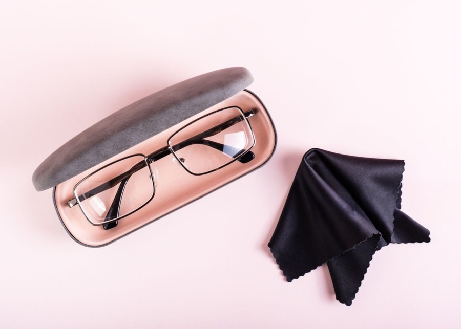 A premium unboxing experience with a custom eyewear case, cleaning cloth, and branded box.